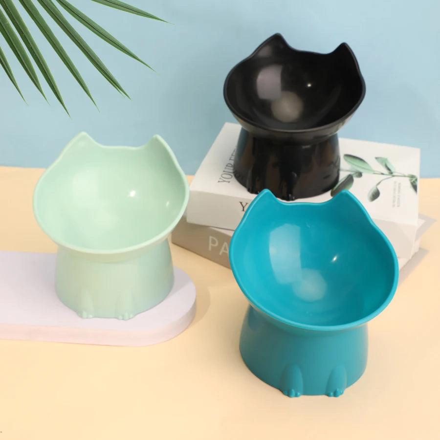 Elevated Cat Bowl Anti Tip Plastic Raised black bowl styled with plant yellow background